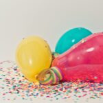 yellow pink and blue party balloons